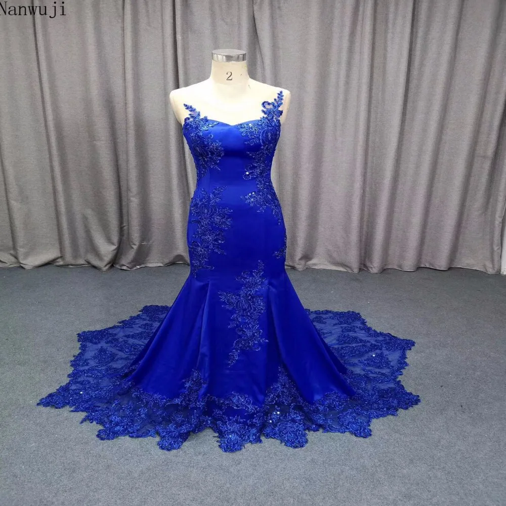 

2018 Royal Blue Sexy Backless Mermaid Evening Dresses SleevelessSheer Crew Neck Appliques Sequins Beaded Rose Skirt Prom