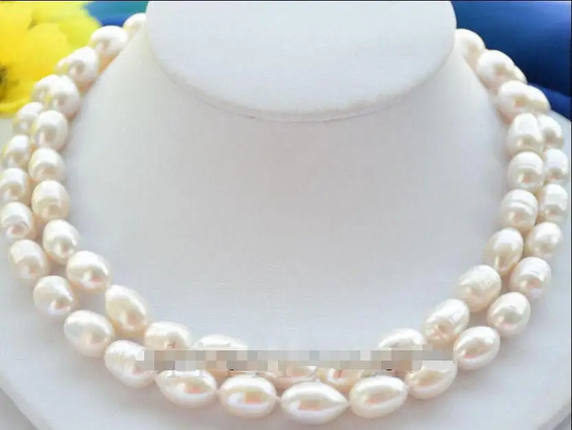 

Free Shipping >>>>> 9-10mm white Baroque Rice freshwater pearl necklace 33
