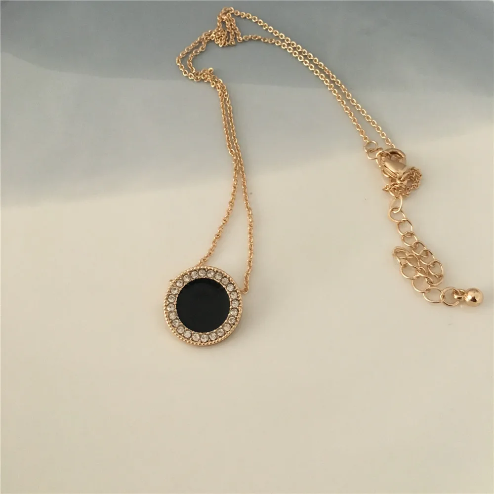 

Gold color plating clear stone with black enamel round disc pendant necklace