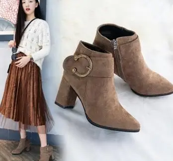 

2018 new women's Martin boots Europe and the United States fashion pointed high-heeled thick with wild boots.