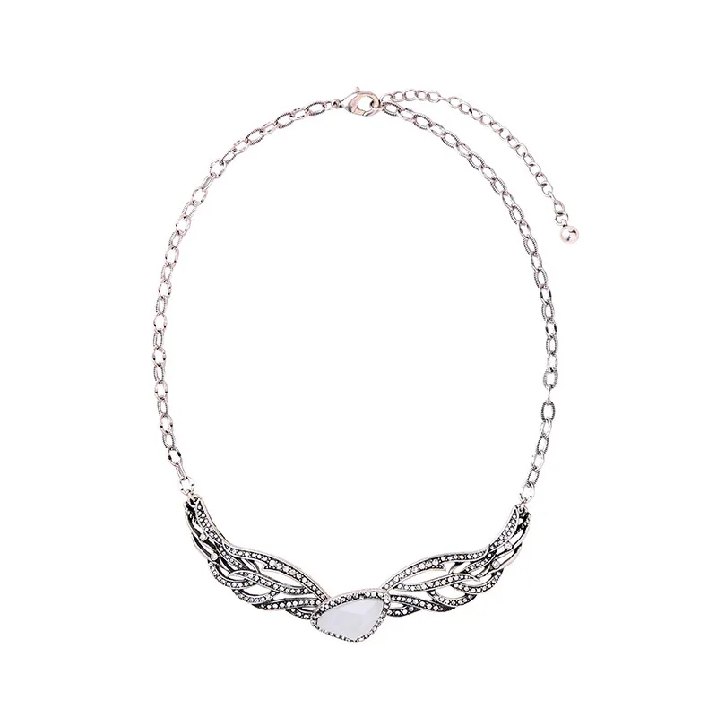 

White Triangle Imitation Gemstone Hollowed Crystal Wing Necklace Collier Femme Silver Color Statement Necklace Retro Jewelry