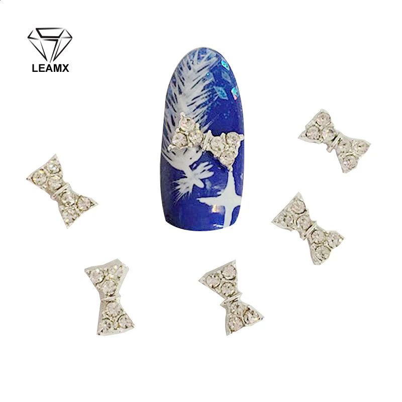 

10 Pcs/bag Nail Alloy Jewelry Silver New Bow Paste The Crystal Nail Manufacturers supply 3D Nail Art Decoration Tools StickersH2