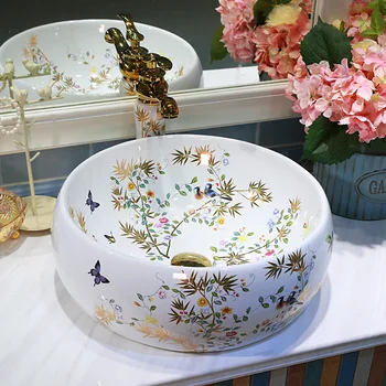 

China Artistic Handmade Ceramic Lavobo Round bathroom sinks Countertop wash basin flower and bird