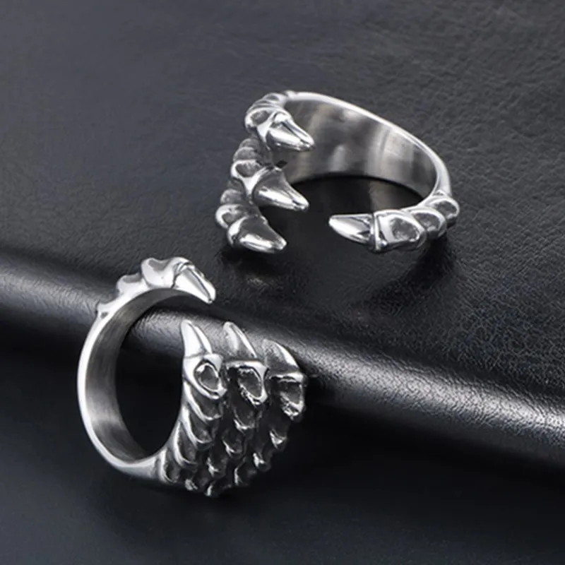 

Titanium steel ring men ring domineering opening African pointed tail ring wave with personality