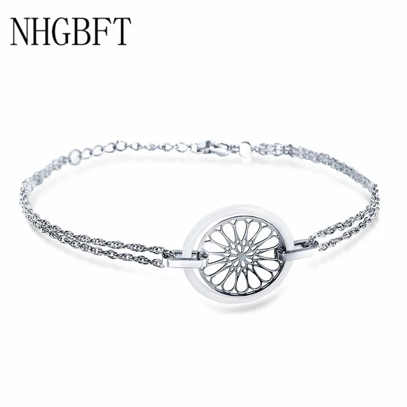 

NHGBFT White Ceramic Bracelets With Hollow Flower jewelry Women Stainless steel bracelet Dropshipping