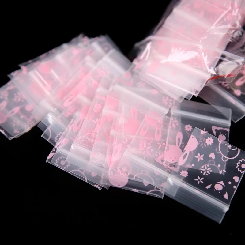 

100pcs 7 Sizes Thicken Zip Lock Bags Jewelry Clear Poly Bag Pink Rabbit Reclosable Plastic Small Gift Packaging Bags & Pouches