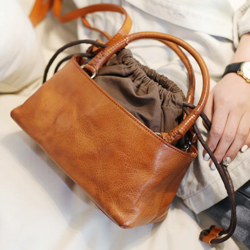AETOO Retro Japanese crossbody bag, drawstring handheld bucket bag, handmade leather female bag, head-layer cowhide casual bag