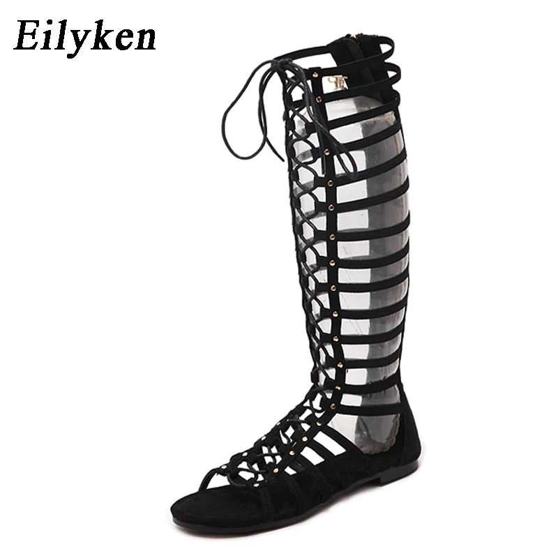 Eilyke جودة عالية جلد النساء الصنادل strappy و الصيف المفتوحة تو الركبة عالية المصارع الصنادل المسطحة الروماني ضمادة عارضة الأحذية
