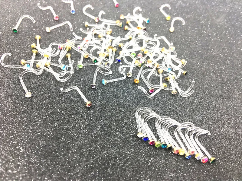 

Free shippment LOT100pcs 20G NOSE RETAINERS HIDE PIERCING CLEAR Gems NOSE RING Screw On Curve STUD Rings Body Jewelry