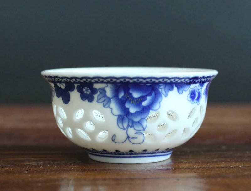 Exquisite Openwork ceramic cup Chinese traditional porcelain teaCup Kung Fu Teacup Tea accessories green tea cup 1pcs