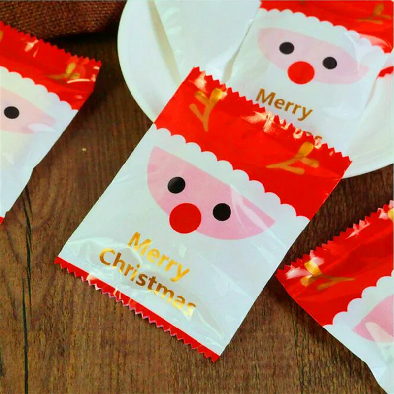 

10PCS=1lot Christmas gift bags Cartoon santa claus bag cute cartoon cookie bag plastic machine bag small jewelry bag 9*11.5cm
