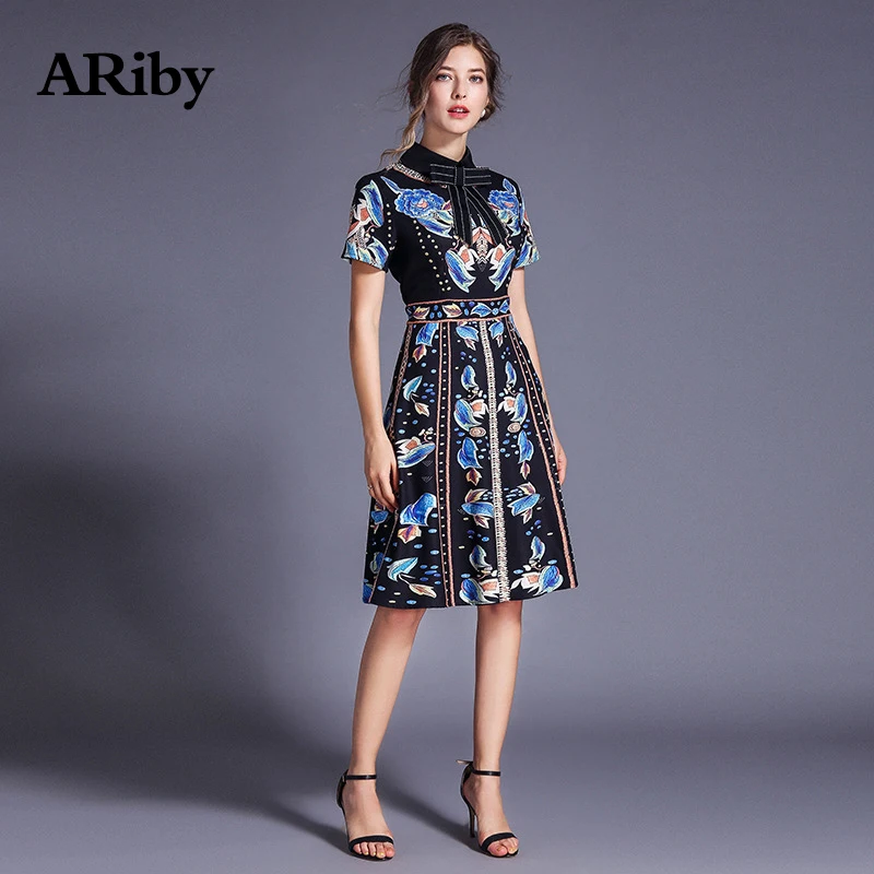 

ARiby Fashion Women Elegant Slim Floral Printed Black Dress 2019 Summer Vintage Short Sleeve Stand Neck A-Line Knee-Length Dress