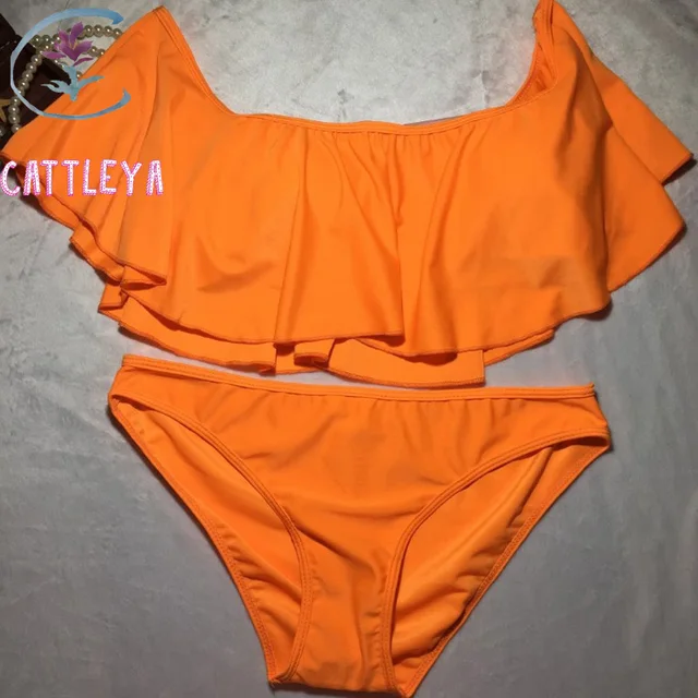 orange and white bathing suit