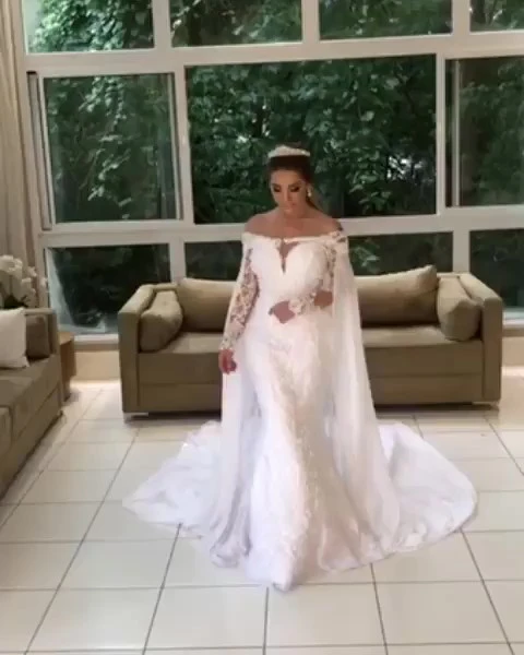 long sleeve wedding dress with cape