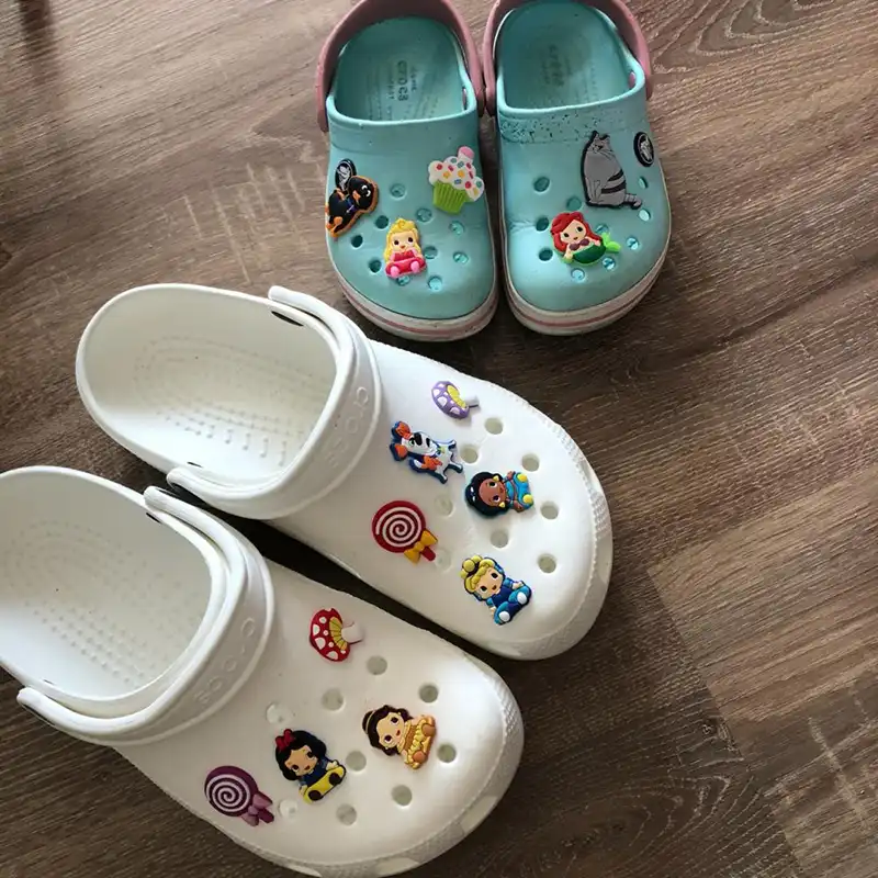 black crocs with charms