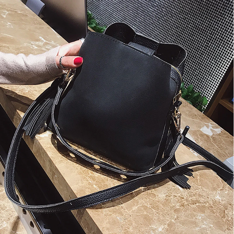 حار فرك النساء دلو حقيبة خمر حقيبة مزيّنة بشريط جلدي جودة عالية الرجعية حقيبة كتف بسيطة Crossbody حقيبة حمل حار فرك النساء دلو حقيبة خمر حقيبة مزيّنة بشريط جلدي جودة عالية الرجعية حقيبة كتف بسيطة Crossbody حقيبة حمل