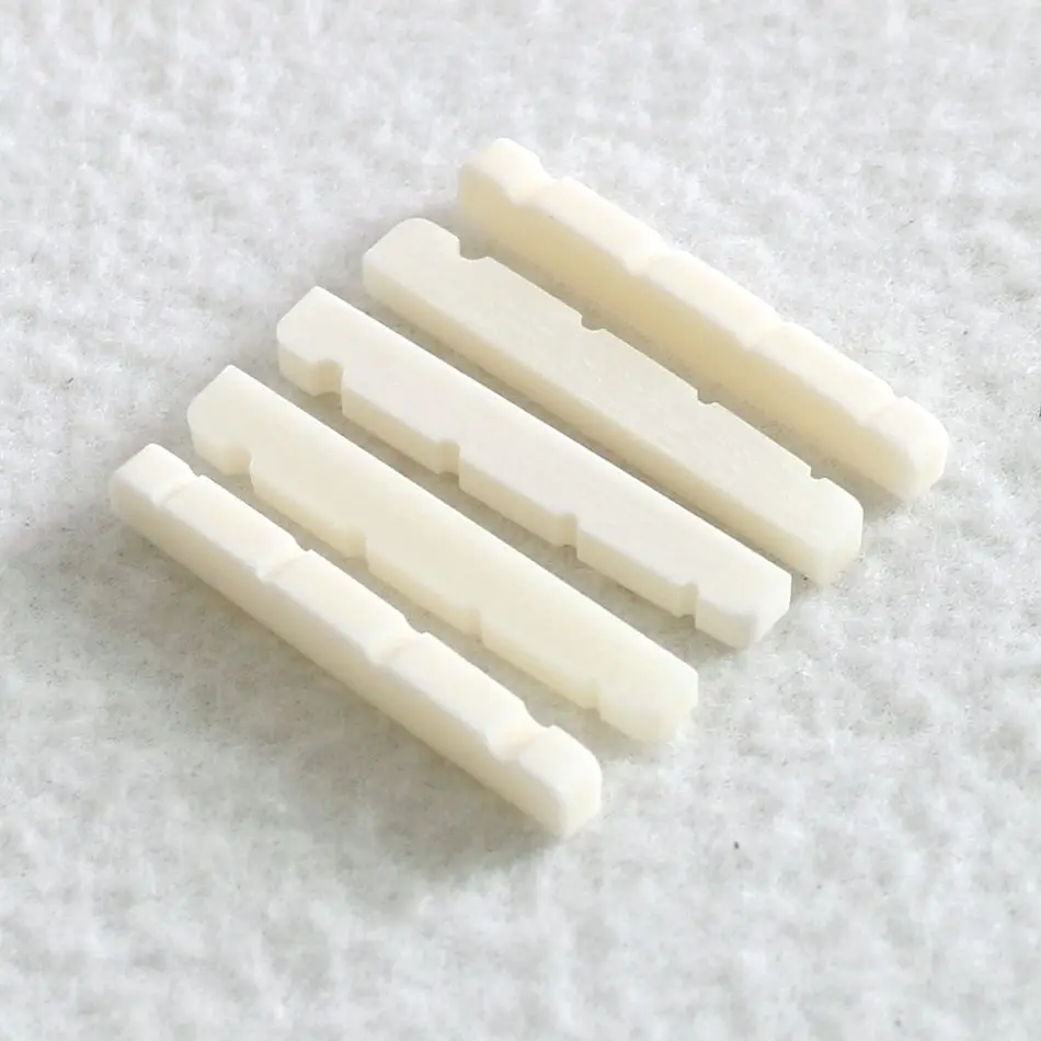 

Sell Free Shipping 5pcs/Pack right handed 38mm 4 String Bone Bass Nut for Jazz Bass Guitar