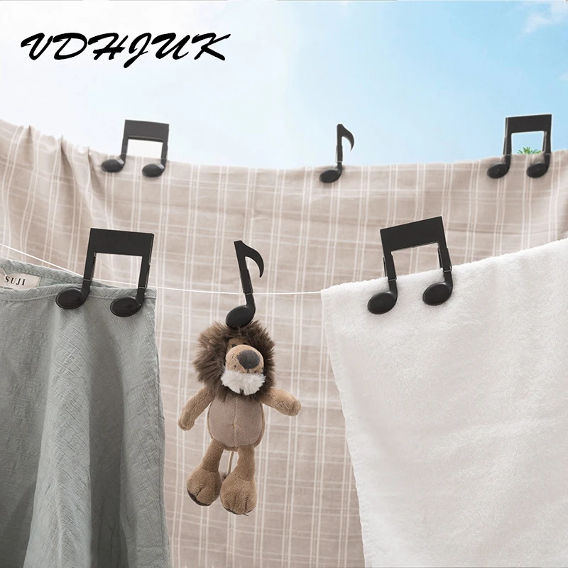 

VDHJUK 2pcs/bag new creative Music notation Clips Clothes Pegs Notes Clothes clip Food Bag Sealing Clip Clothes hangers rack