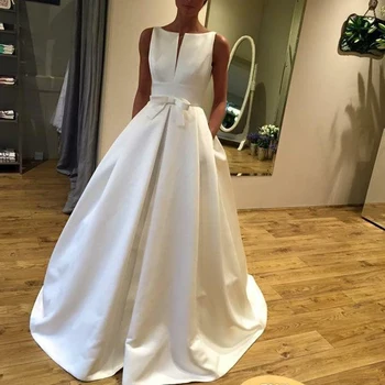 

Cheap A Line Wedding Dresses 2019 Scoop Neck Sleeveless Backless Bow Sweep Train Satin Country African Bridal Gowns New