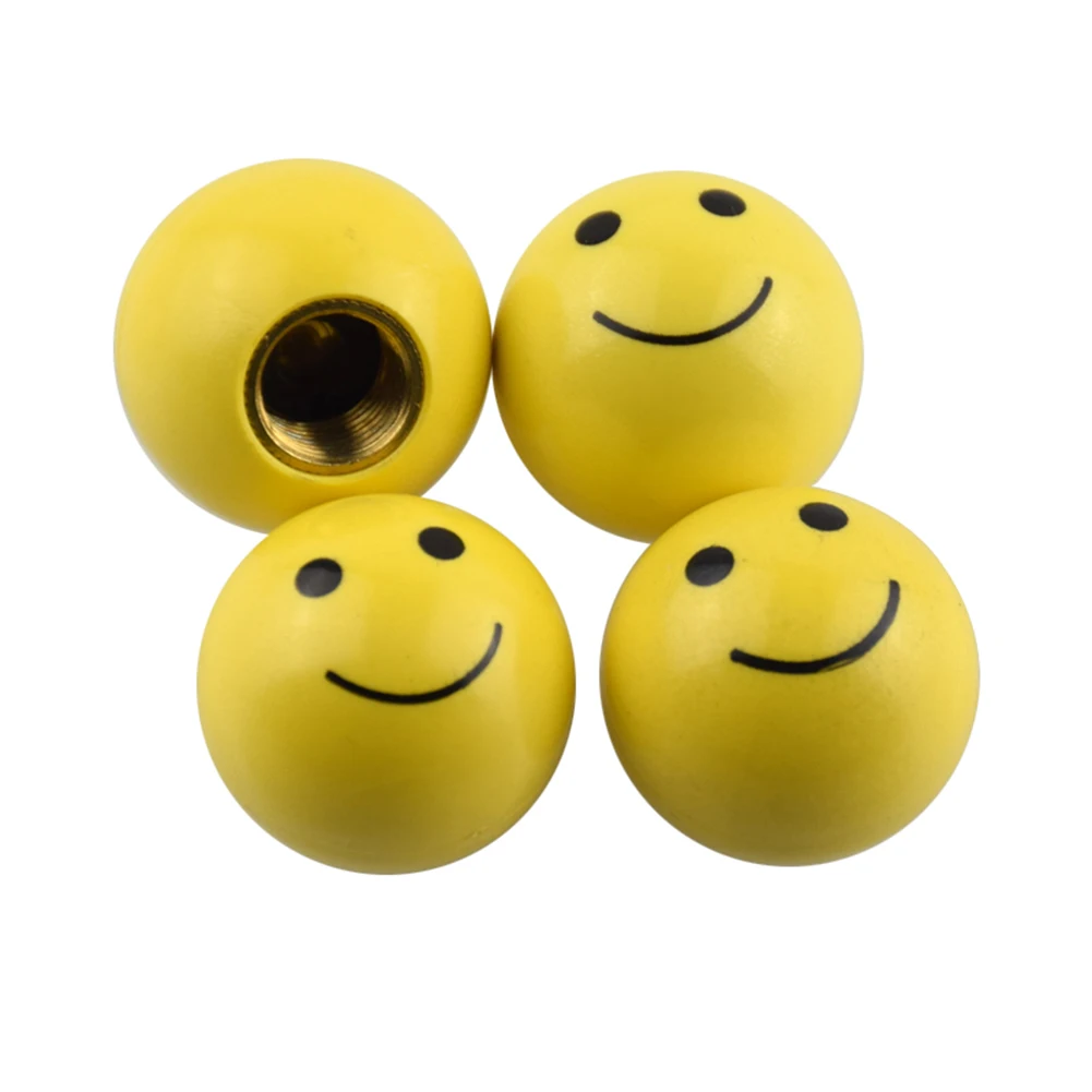 

4 pcs car Wheel Tyre Tire Valve Stems Caps Yellow Smile Happy Face Ball Universal motorcycles cars vans bicycles Valve Caps