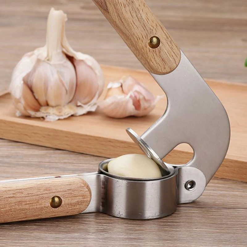 

Stainless Steel Kitchen Garlic Press With Wood Handle Garlic Crusher Ginger Cutter Press Cutter Kitchen Accessories