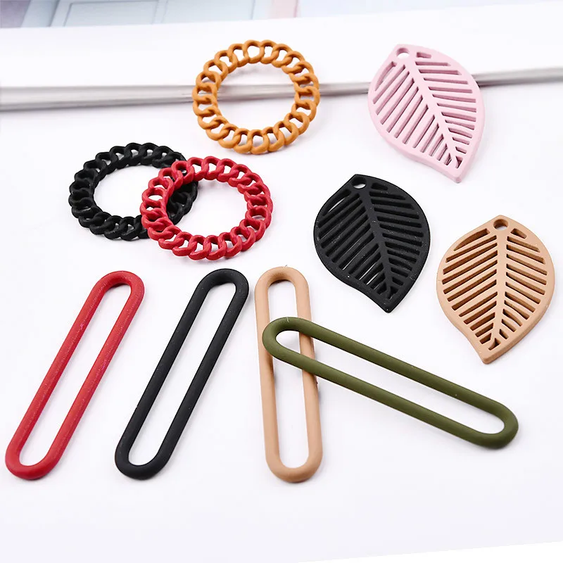 

Diy handmade ear jewelry accessories Korea alloy patent skin hollow leaves round earrings earrings pendant pendant material