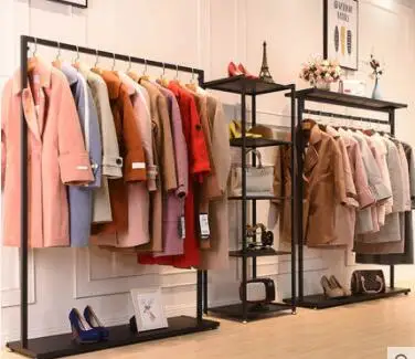 

Shop Golden Shelf Show Rack Ground Clothing Hanger Oval Table Platform Simple.