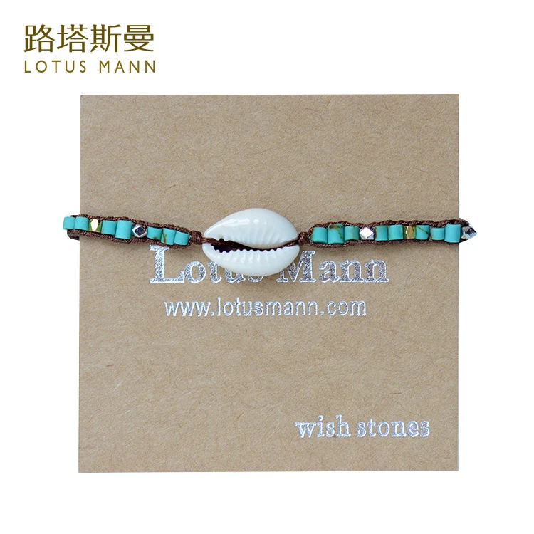 

Lotus Mann Shell and a hoard of blue glass bead weaving lap adjustable fine bracelet 0825