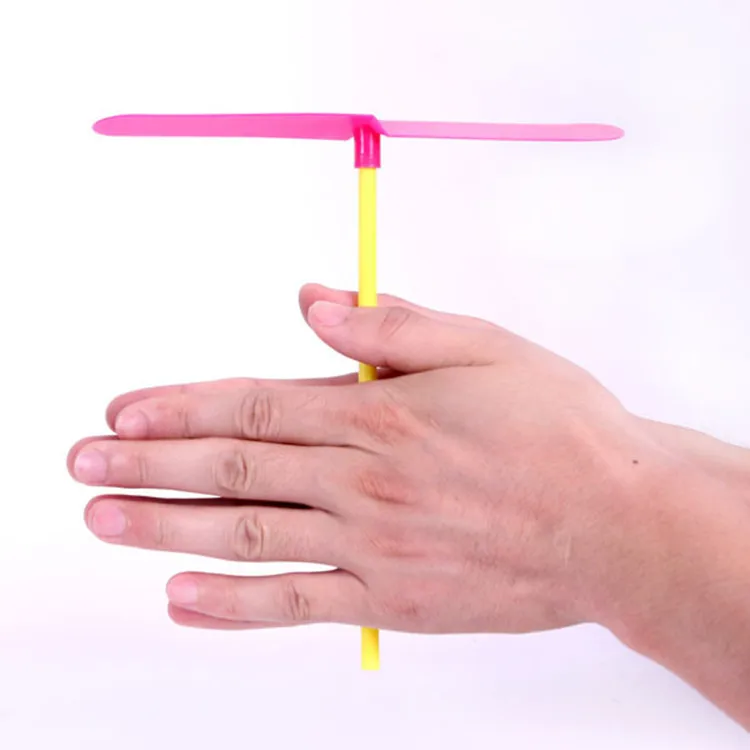 

Plastic bamboo dragonfly hand rubbing bamboo dragonfly flying toy