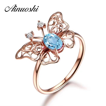 

AINUOSHI 1.5 Carat Oval Cut Natural Blue Topaz Butterfly Ring Genuine 925 Silver Rose Gold Color Double Hollowed Butterfly Ring