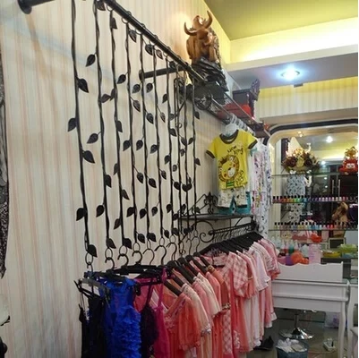 , wrought iron clothing rack clothing display shelf, women's clothing store rings dress hanger shelf on the wall hang a wall