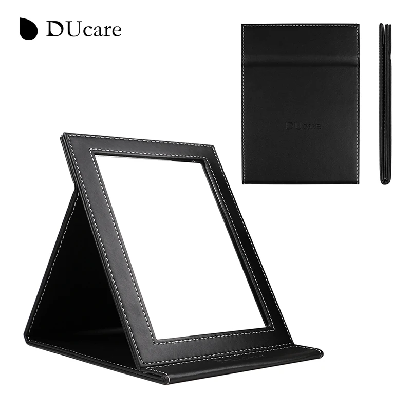 

DUcare 1pc New Korean fashion leather PU cosmetic mirror portable folding utility creative school desktop mirror free shipping