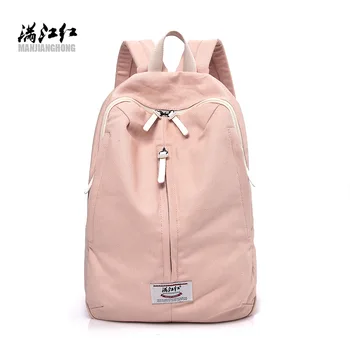

2018 trend new simple solid color backpack female fashion Joker couples high-capacity student bags