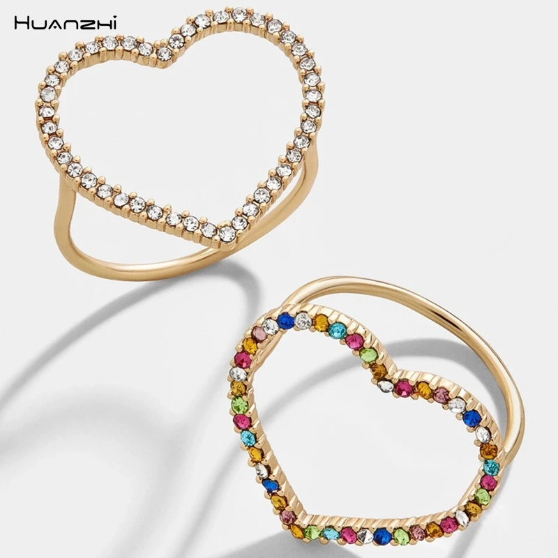 

HUANZHI New 2019 Heart Hollow Colourful Rhinestone Zirconia Geometric Cocktail Ring for Women Girls Party Accessories Jewelry