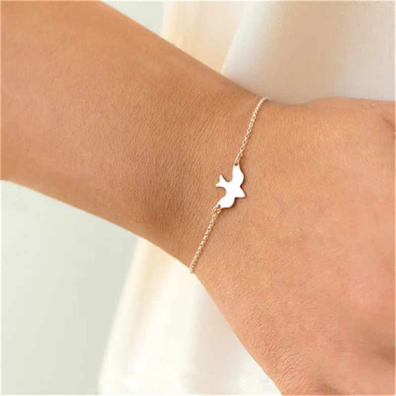 Us 1124 19 Off10pcstiny Peace Dove Bracelet Soar Flying Birds Bracelet Little Cute Swallow Baby Bird Bracelets Delicate Bird Bracelets In Chain - 
