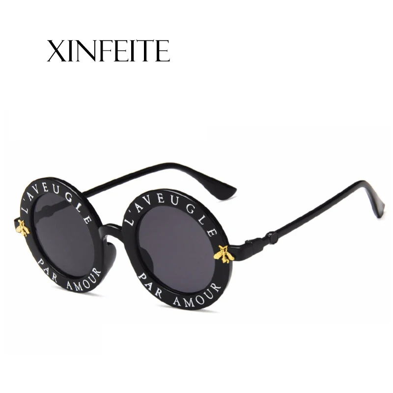 Солнцезащитные очки Xinfeite модные индивидуальные с буквенным принтом и круглой