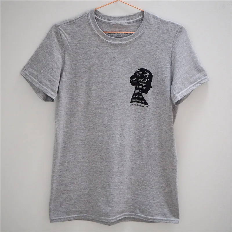 

LUSLOS A loose fit women's t-shirt screen printed with an inspiring quote I am no bird and no net ensnares me tee tops