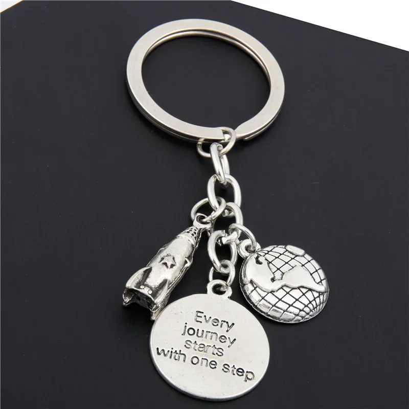

1pc Personalised Rocket Ship Keychain Earth Charms Astronaut Space Custom Keyring Words Every Journey Gift E1656