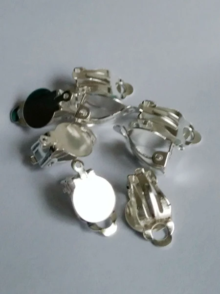 

Free shipping 500PCS Silver plated 10mm earring pad earring clip findings for DIY jewelry making CFS187