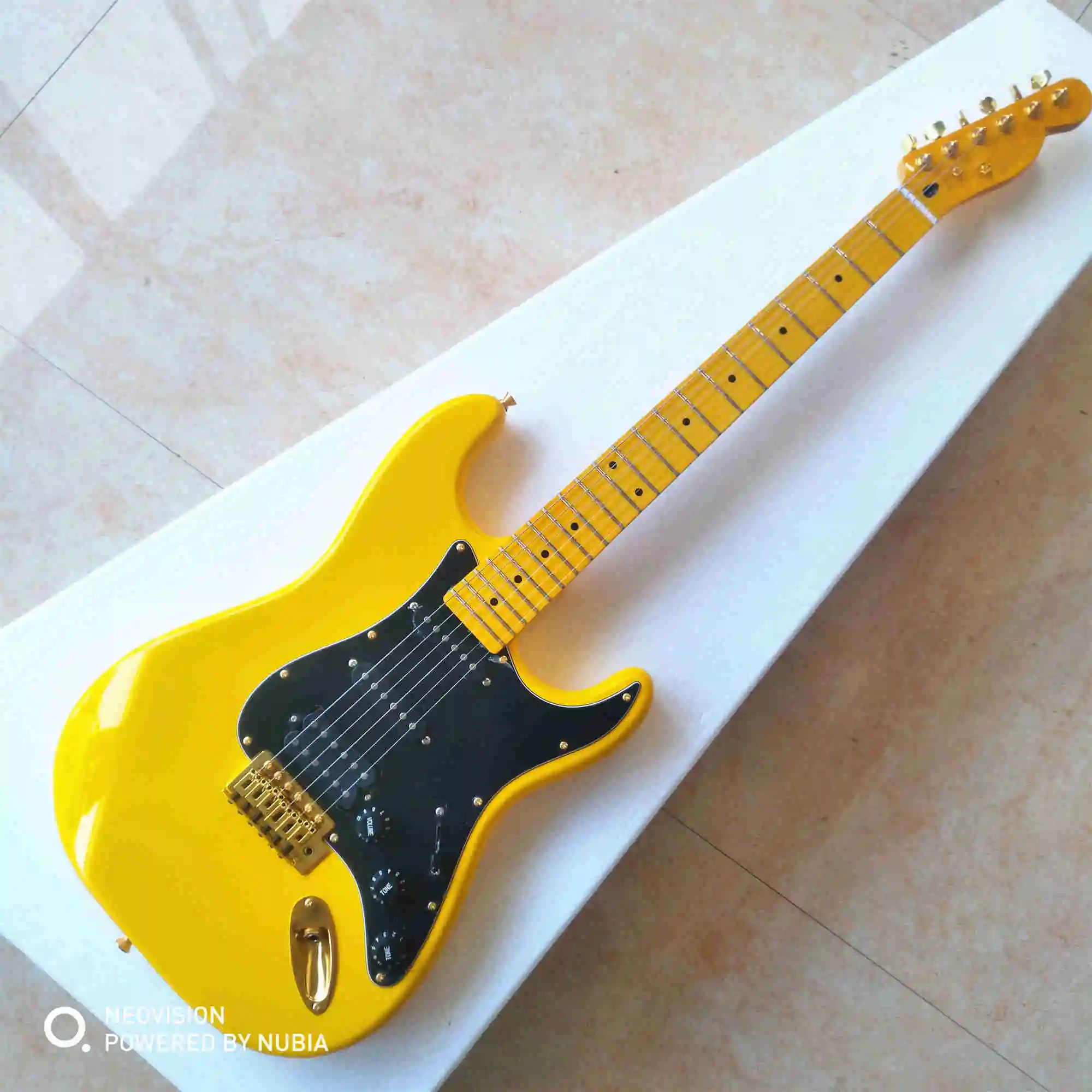

Customized v-shaped flying electric guitar color is optional for beginners