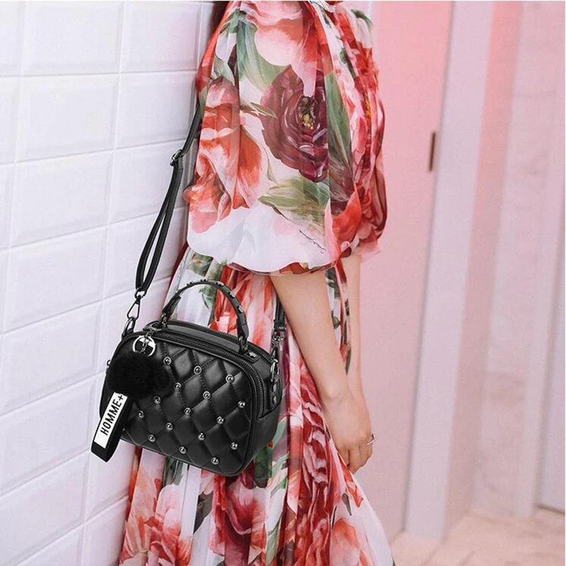 

Fashion solid color rivet retro rhombic female handbag PU leather Korean version of the trend casual woman Messenger bag