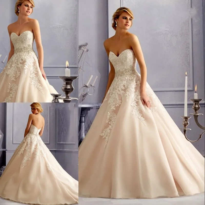 accessorizing champagne ball gown wedding dress