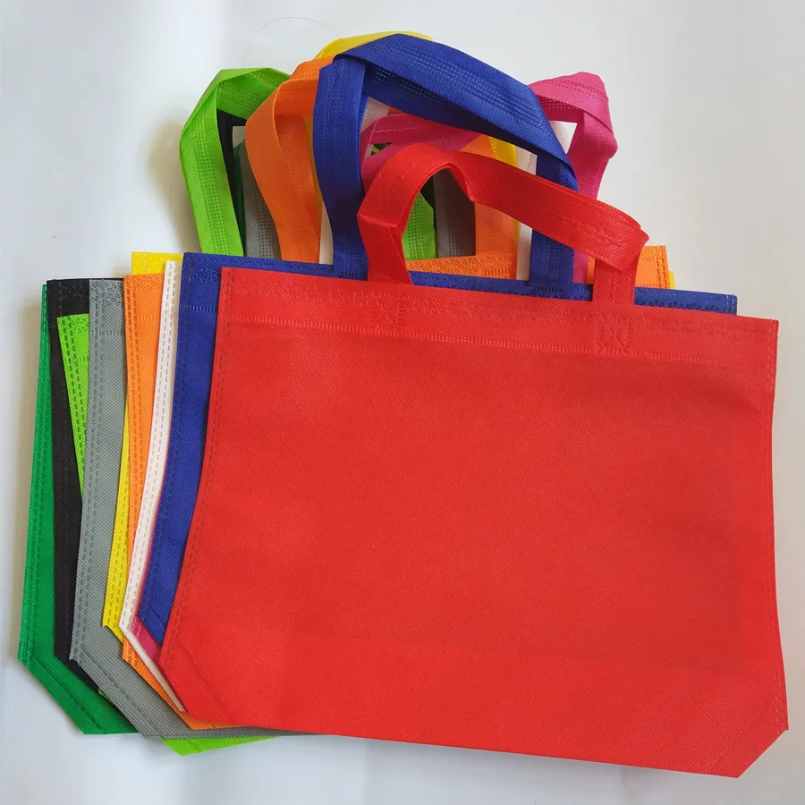 Buy 50pcs 33*26cm 10 colors eco non woven fabric gift