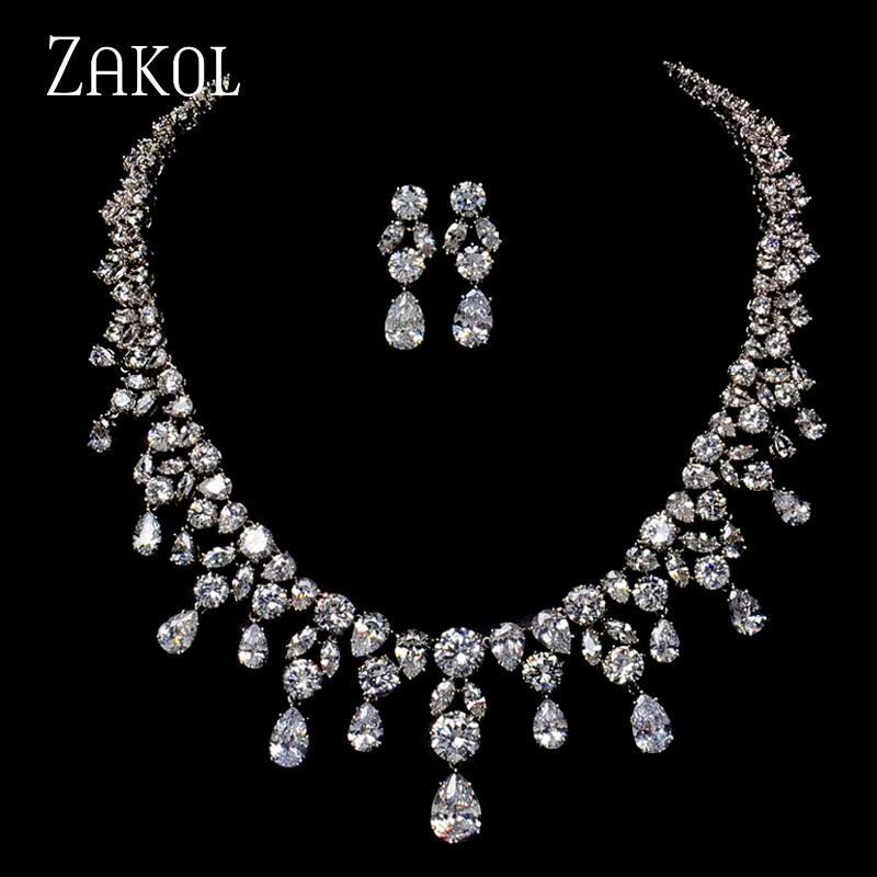 ZAKOL Gorgeous Design Dazzling Disperse Stone Drop Pear Shape Ruby Color Cubic Zirconia Diamond Bridal Jewelry Set FSSP034