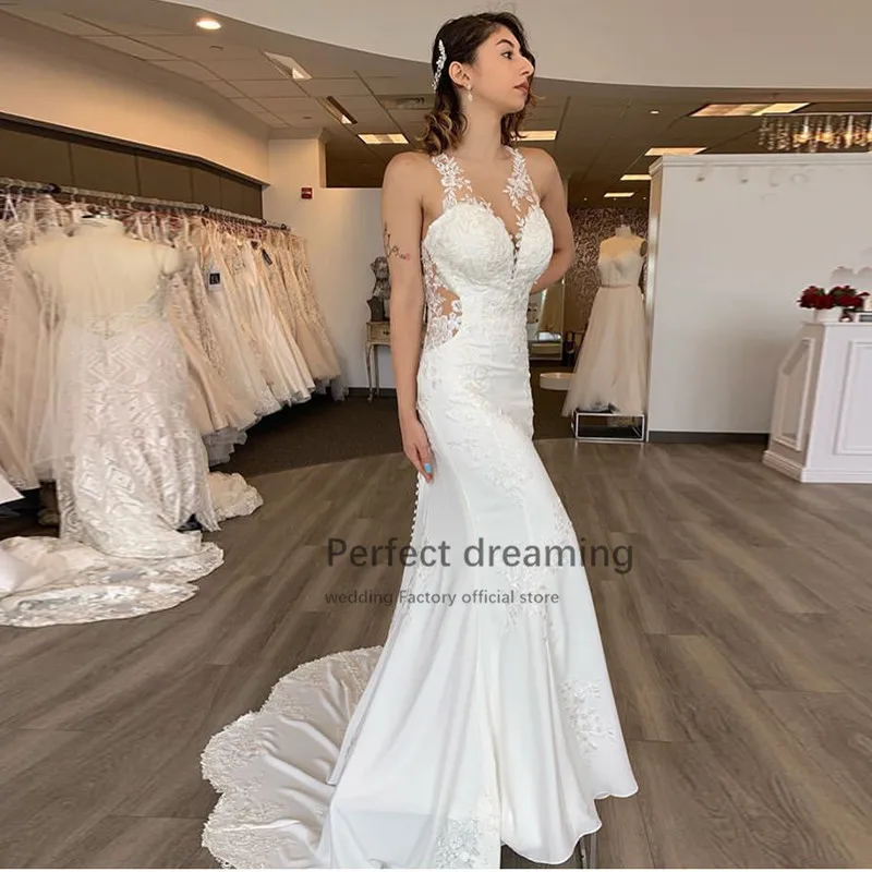 

Gorgeous Mermaid Wedding Dress Halter Neck Appliques Bridal Dress White Ivory Backless Vestido De Noiva Chapel Train