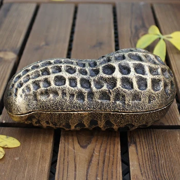 

Antique Black Gold Peanut Shaped Cast Iron Jewelry Storage Trinket Box