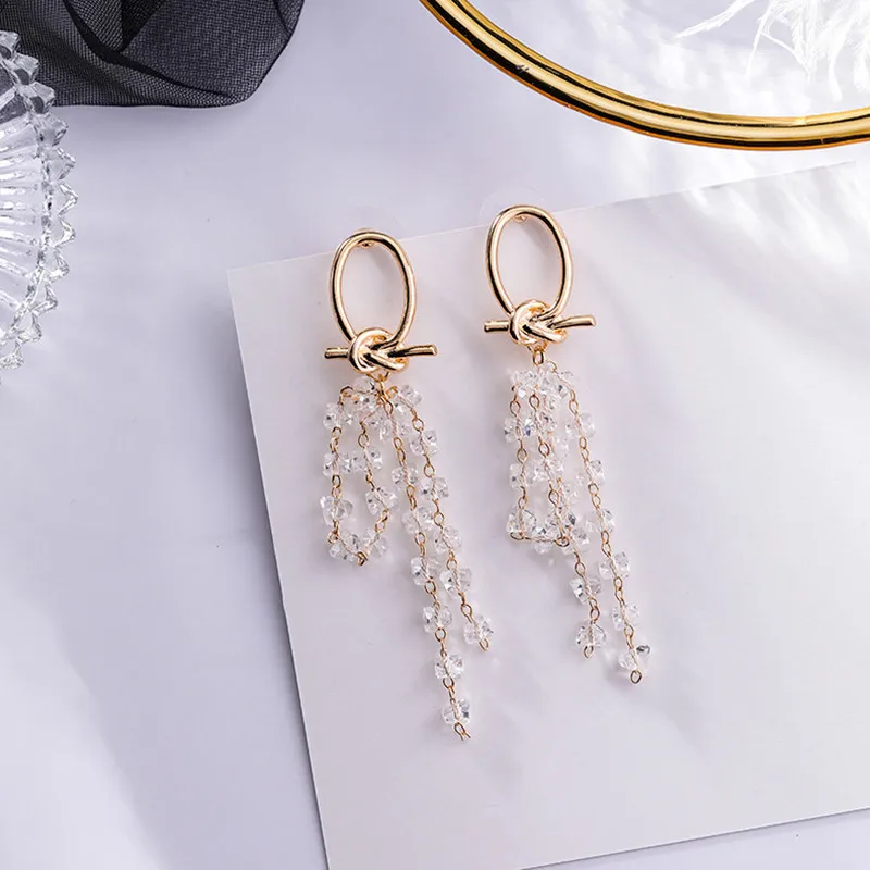 

Dominated The new 2019 simple metal knot winding long crystal fashion sweet temperament Women Drop earrings