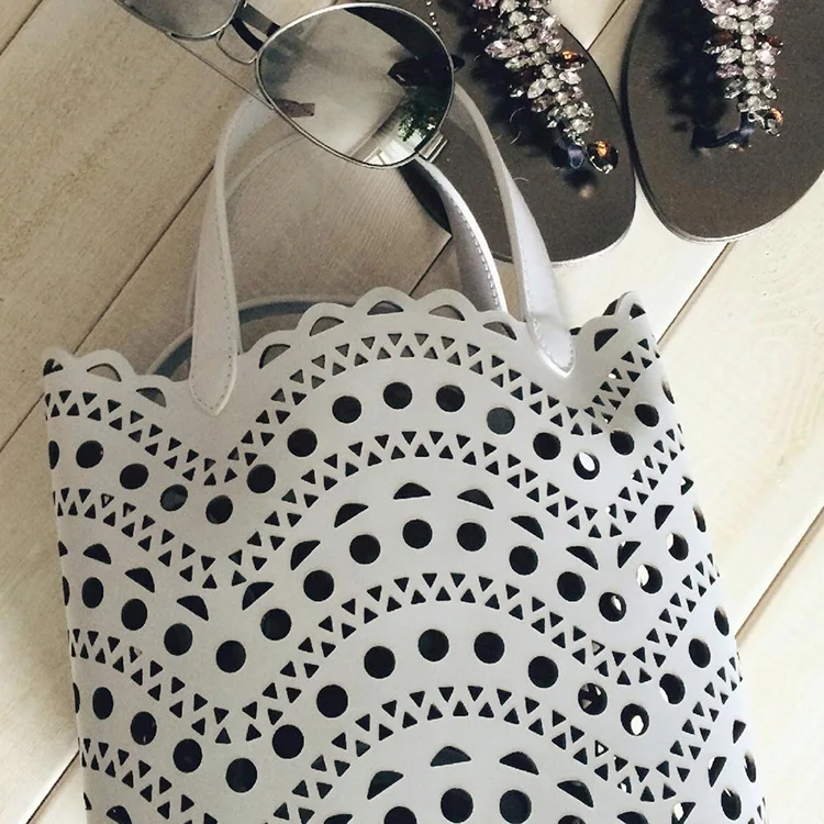 

single shoulder bag the European and American fashion PU hollow out hand his female formula mother bucket bag wholesale
