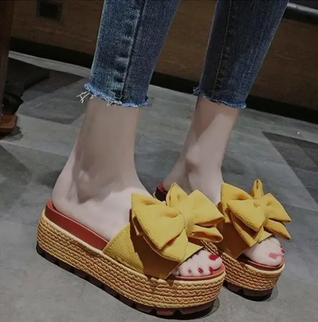 

Bow slippers women's summer wear 2019 new wild students thick bottom increased beach word drag