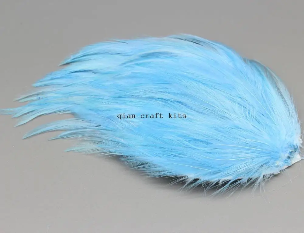 

12 pcs BLUE Feather Pad Applique. DIY craft item for millinery, masks, costumes, hats, headdresses, headbands and hair clips